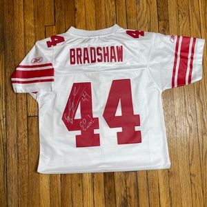 Vintage signed by Ahmad Bradshaw from the New York giants youth jersey